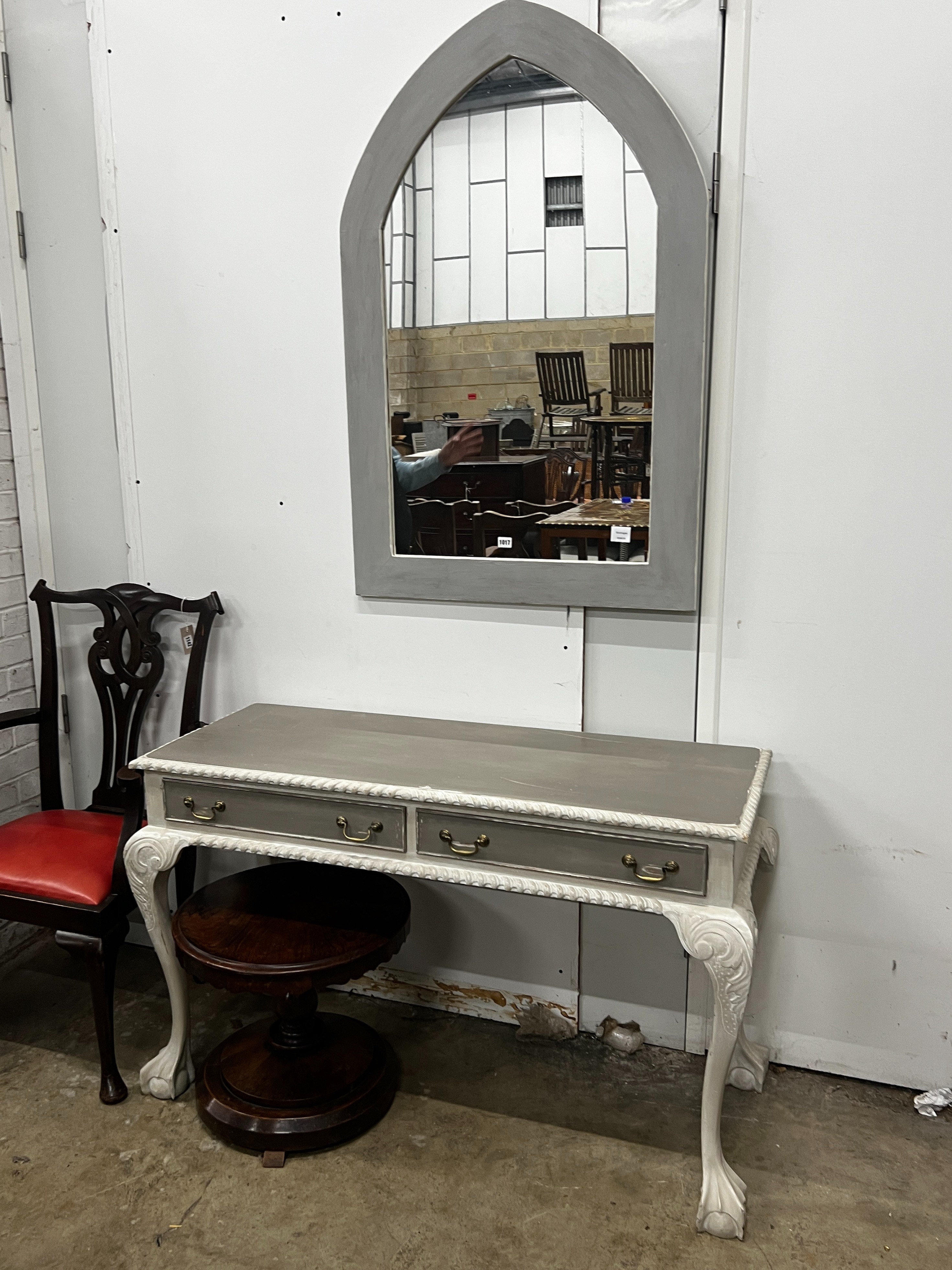 A Chippendale revival later painted two drawer console table, width 127cm, depth 53cm, height 77cm with similar arched mirror, height 120cm